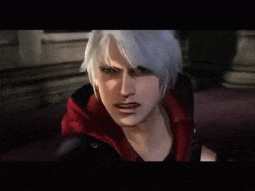 Dante holds back Nero`s Devil Bringer Arm!