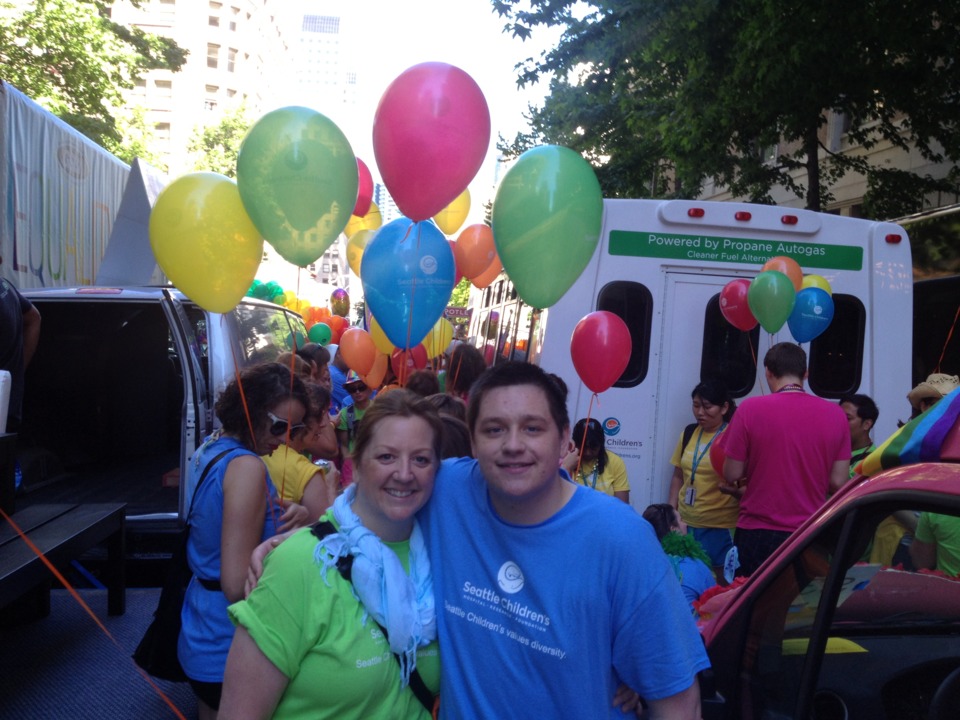 My mom and I walking with Seattle Children's Hospital during last year's Seattle Gay Pride Parade