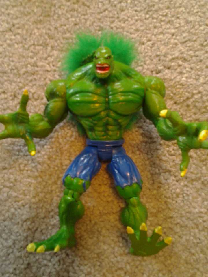 Hulk 2099 - Sadly at some point in my childhood I decided to cut the hair from the top of his head. He had a chainsaw that attached to his wrist. I have no idea why Hulk needs a chainsaw but OK.